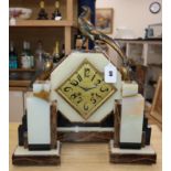 An Art Deco Gauvin, mixed marble clock garniture surmounted with stylised bronze pheasants, signed