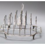 A George III silver seven bar toastrack, Michael Plummer, London, 1795, length 16.4cm.