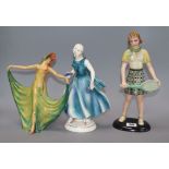 A Wade figure of a lady and two others 29.5cm