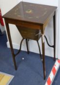 An Edwardian painted topped work table with central cartouche W.40cm