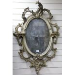 A Victorian gilt gesso wall mirror, with an oval plate H.120cm