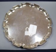 A George V silver salver with piecrust border, Birmingham, 1934, 25.3cm, 15 oz.