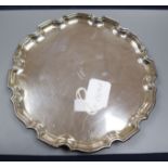 A George V silver salver with piecrust border, Birmingham, 1934, 25.3cm, 15 oz.