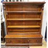 A Victorian mahogany four shelf open fronted bookcase, with two drawer to base W.142cm