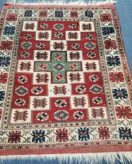 A Turkish ivory ground rug 160 x 130cm