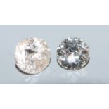 Two unmounted round cut diamonds, approximately 0.41cts and 0.50cts, the latter a.f.