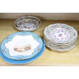 A set of six pierced Dresden plates with two matching graduated bowls and two Continental cabinet