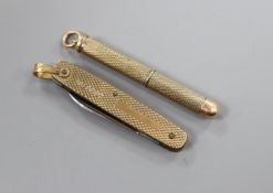 A 9ct gold cased penknife and an Asprey & Co 9ct gold cased propelling toothpick.