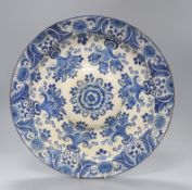 A faience pottery blue and white charger Diameter 34cm