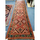 A Turkish geometric runner 370 x 95cm