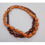 Two simulated amber bead necklaces.