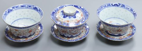 Three Chinese rice bowls and stands, one with cover Tallest H.8cm including cover