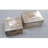 Two silver cigarette boxes, largest 11.2cm.