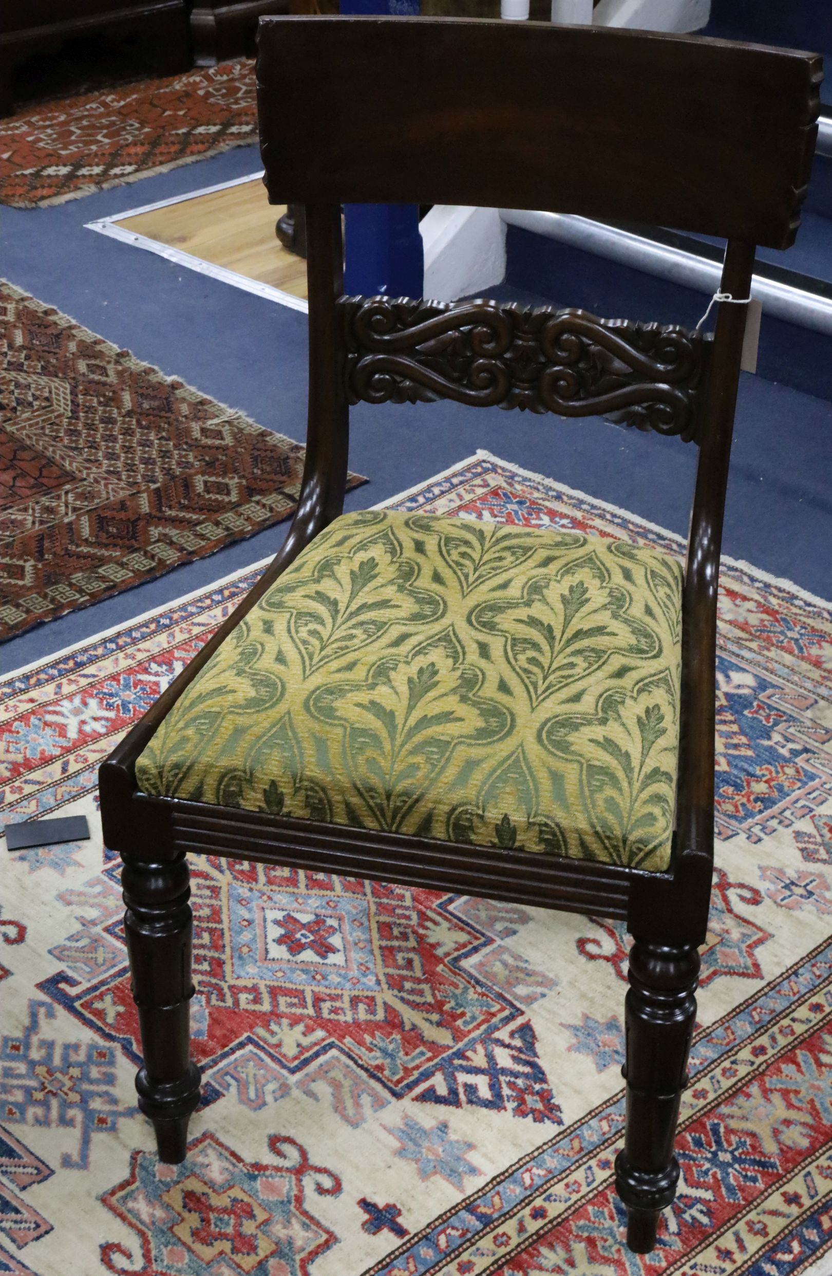 A set of four William IV mahogany dining chairs