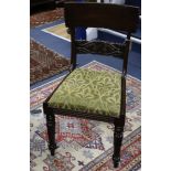 A set of four William IV mahogany dining chairs