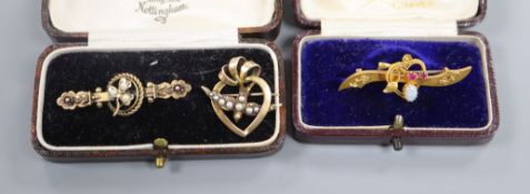 Three assorted early 20th century 15ct and gem set bar brooches including white opal and ruby,