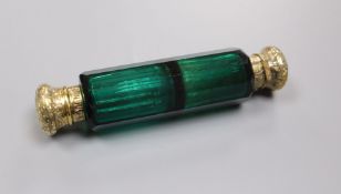 A late Victorian gilt white metal mounted double ended green glass scent bottle, 12.7cm.