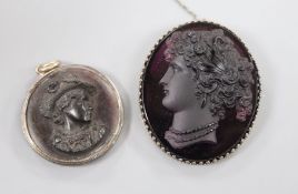 A metal mounted amethyst paste cameo carved with the bust of a lady to dexter and a tortoiseshell