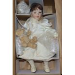 Three modern boxed dolls