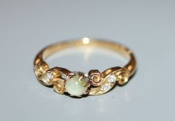 An Edwardian 18ct gold, cat's eye chrysoberyl and diamond set dress ring, size M/N.