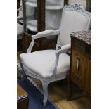 A pair of French painted fauteuils