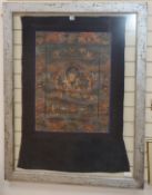 A Tibetan thangka H.106cm. W.68cm