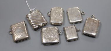Seven assorted late 19th/early 20th century silver vesta cases, largest 47mm.