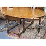 An 18th century and later fruitwood gateleg dining table W.176cm