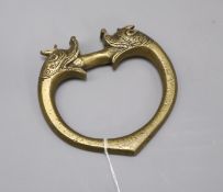 A Persian bronze handle/knocker