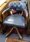 A pair of Norweigan Ring Mekanikk swivel desk chairs