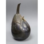 A Japanese Meiji period bronze model of an aubergine, mounted with a preying mantis, signed and with