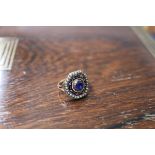 A 19th century yellow metal, sapphire, seed pear and three colour enamel set octagonal dress ring,