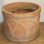 A pair of terracotta planters Diameter 54cm