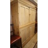 A Victorian and later pine cupboard in two sections Approx. W.160cm