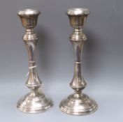 A pair of modern silver candlesticks by W.I. Broadway & Co, Birmingham, 1967/8, 25.3cm.