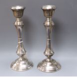 A pair of modern silver candlesticks by W.I. Broadway & Co, Birmingham, 1967/8, 25.3cm.