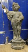 A reconstituted stone garden putti H.82cm