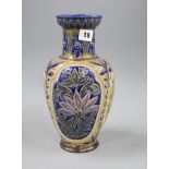 A Doulton Lambeth trilobed vase, by Frances E Lee, dated 1879, with flower and foliate incised