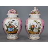 A pair of Dresden vases and covers
