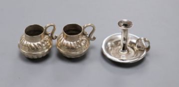 A pair of late Victorian Britannia standard silver miniature mugs and a late Victorian miniature