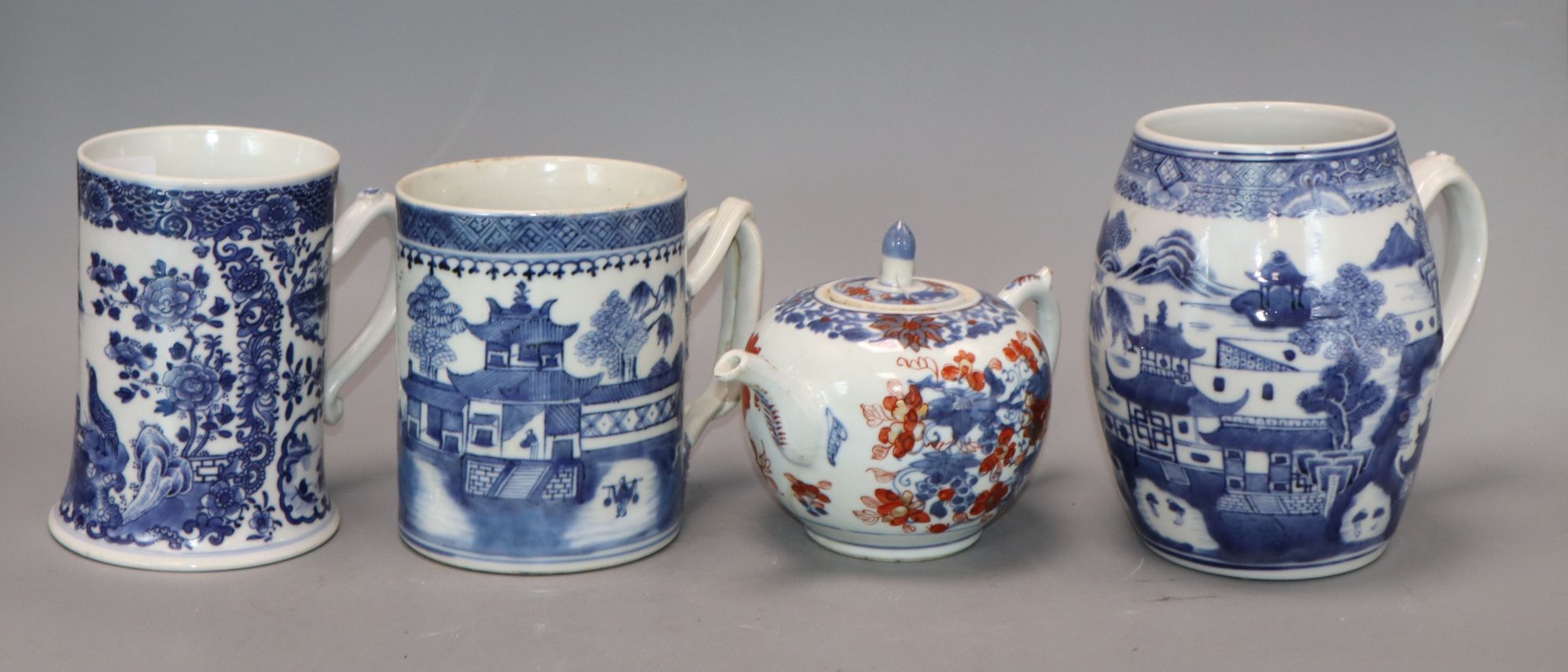 Three Chinese blue and white mugs, Qianlong period and a Chinese Imari teapot and cover, early