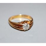 A George V 18ct gold and claw set solitaire diamond ring, diameter of stone is approximately 6mm,