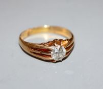 A George V 18ct gold and claw set solitaire diamond ring, diameter of stone is approximately 6mm,