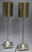 A pair of brushed steel table lamps height 53cm