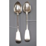 Two Victorian silver fiddle pattern basting spoons, one initialled, one monogrammed