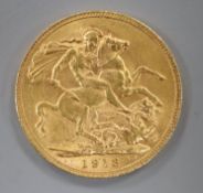 A 1913 gold full sovereign.