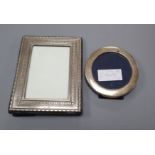 Two modern silver mounted photograph frames including circular, largest 18cm.