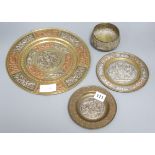 A mixed metalware set of Indian plates and a bowl