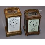An early 20th century brass repeating carriage clock, retailed by Dent and one other brass