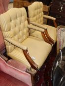 A pair of George III style Gainsborough armchairs, ex Carlton Club, London, purchased by directly by